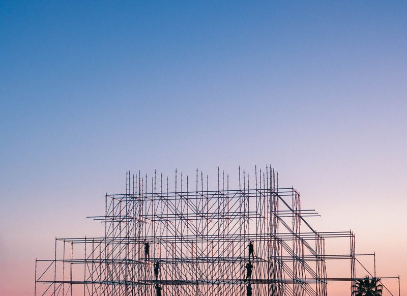Scaffolding structure silhouetted at dusk
